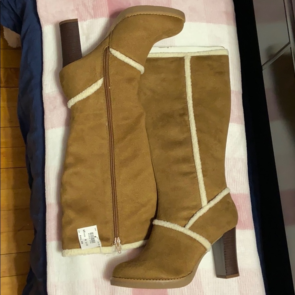 Knee length high heel boots